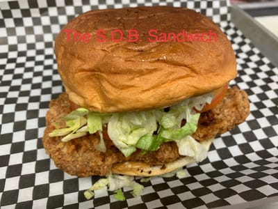 Battered Men's BBQ & Fish House