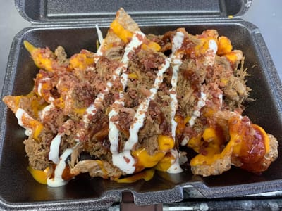 Battered Men's BBQ & Fish House