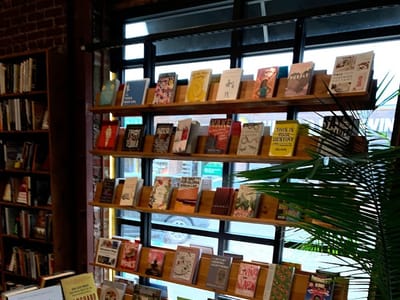 The Dusty Bookshelf - Manhattan