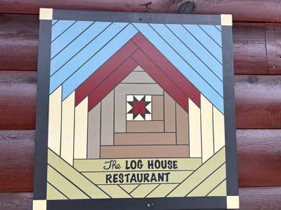 The Loghouse at Lansing, LLC
