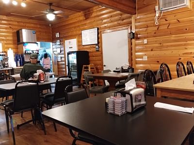 The Loghouse at Lansing, LLC