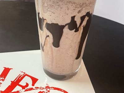 The Slick Hen Sippin Den